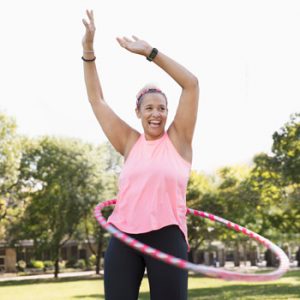 Woman with hula hoop not worried about Incontinence and Prolapse